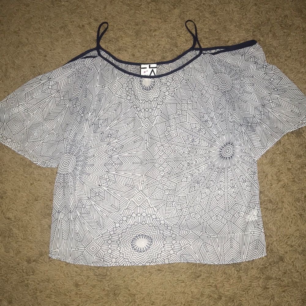 Blue and white patterned blouse
